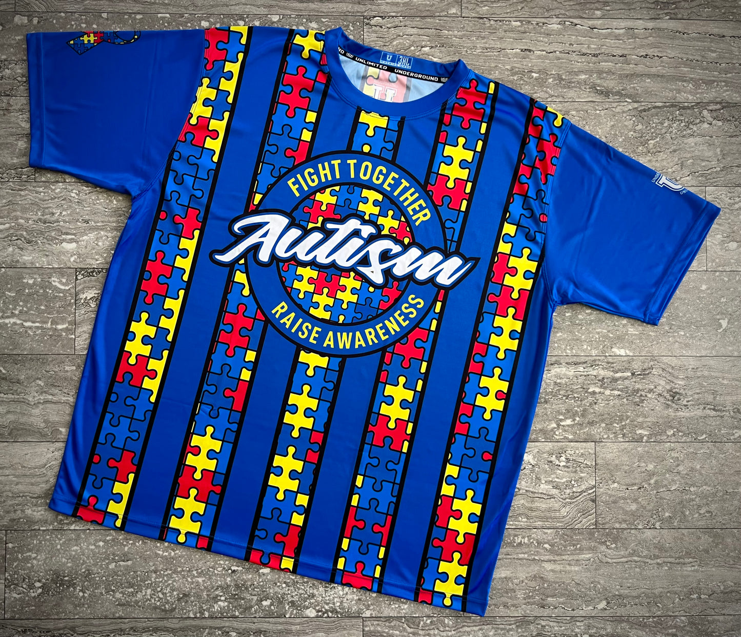 Autism Performance Apparel ~ Blue Puzzle Ribbon