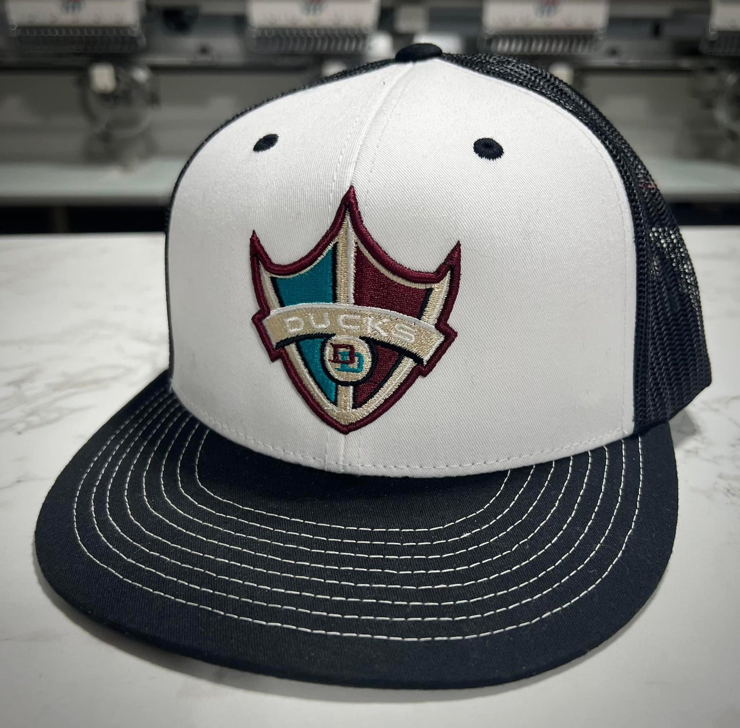 Delaware Ducks Embroidered Hat ~ Classic Ducks Logo {White/Black ~ Snapback}