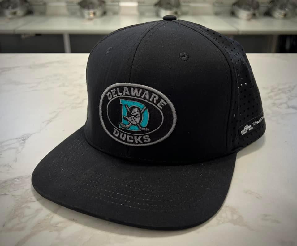 Delaware Ducks Embroidered Hat ~ Round Delaware Ducks Blackout/Teal Logo {Black ~ Flexfit/Snapback}